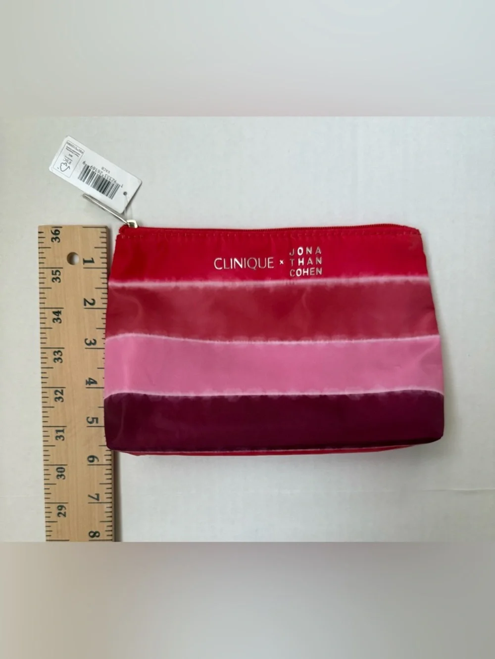 Clinique x Jonathan Cohen Zip Top Cosmetic Bag Red to Pink Ombre Striped